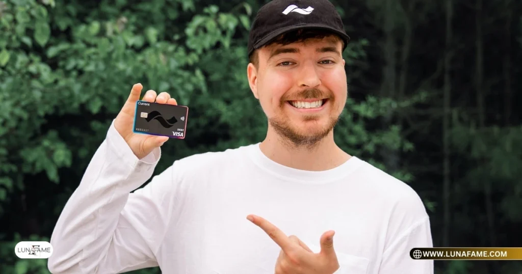 MrBeast, also known as Jimmy Donaldson 
holding visa card